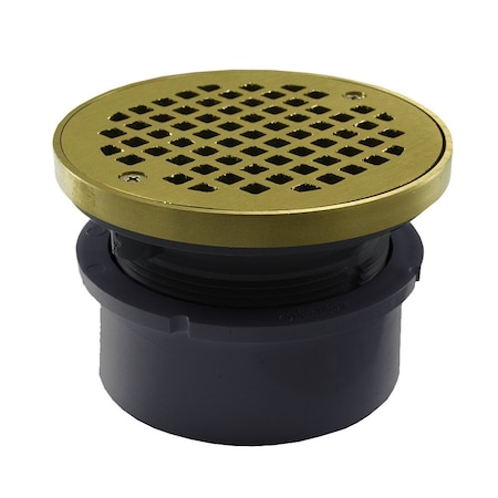 Jones Stephens 4in. PVC Hub Fit Drain Base with 3-1/2in. Plastic Spud and 5in. Polished Brass Strainer with Ring D53402